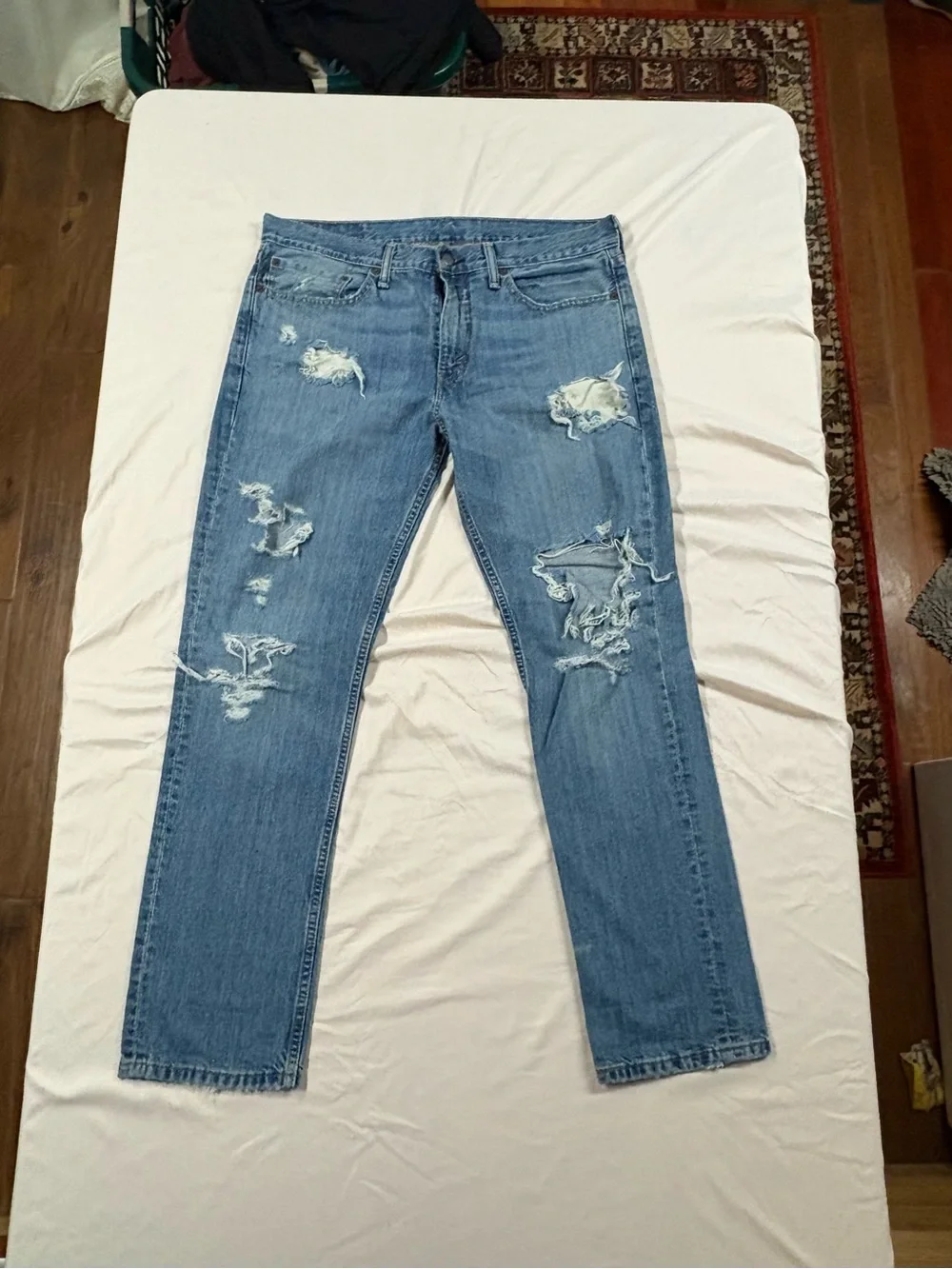 Levi's Men's Distressed Light Blue Straight Leg Denim Jeans